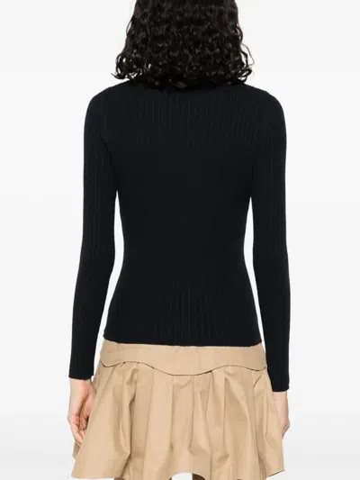 Sandro Poloshirt Aus Geripptem Strick In Blue