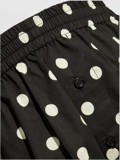 Moschino Dotted Shorts With Elastic Waistband And Button Detailing In Black