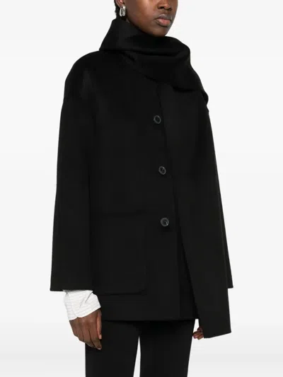 The Dynamis Studio Patch-pockets Single-breasted Coat In Black