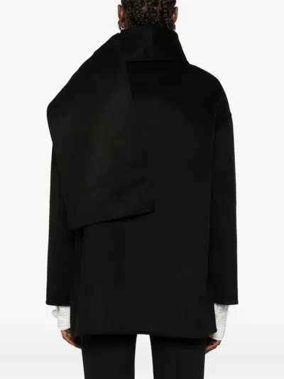 The Dynamis Studio Patch-pockets Single-breasted Coat In Black