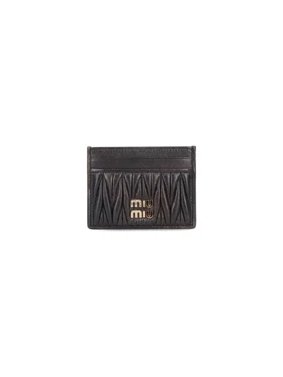 Miu Miu Quilted Black Lamb Leather Compact Wallet In Black