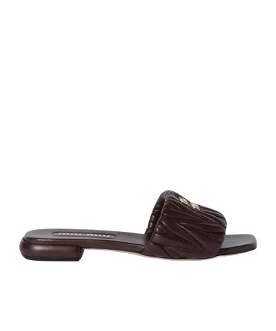 Miu Miu Matelassé Nappa Leather Slides In Black