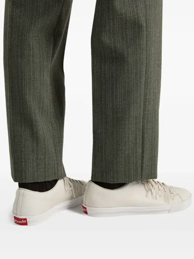 Prada Low Profile Round Toe Rubber Sole Sneakers In White