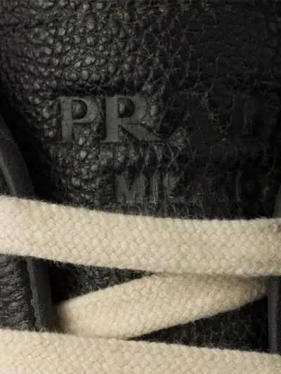 Prada Aged-effect Leather Sneakers In Black