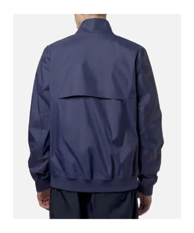 K-way Short Waterproof Jacket With Hood And Elastic Hem In Blue