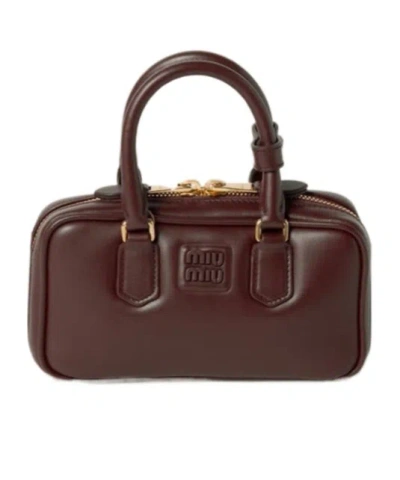 Miu Miu Soft Padded Shoulder Bag And Handles In Brown