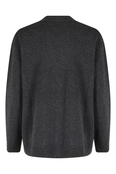 Seventy V-neck Long Sleeve Cardigan With Center Button Closure And Side Pockets In Black