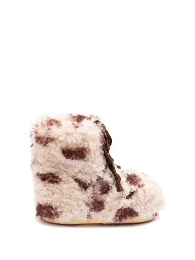 Moon Boot Icon Low Curly Boot With Cow Print In Gold