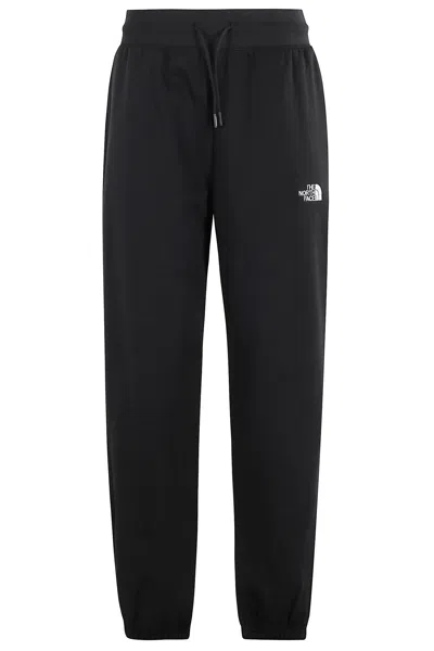 The North Face Womens Essential Relaxed Brand-embroidery Cotton-blend Jogging Bottoms Black In Black