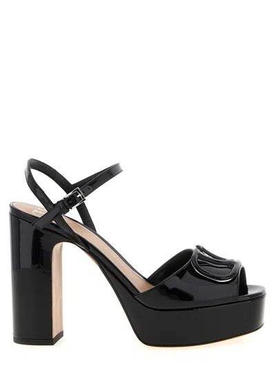 Valentino Garavani Valentino Vlogo 115 Patent Platform Sandal In Black