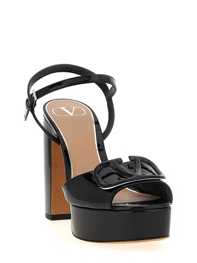 Valentino Garavani Valentino Vlogo 115 Patent Platform Sandal In Black
