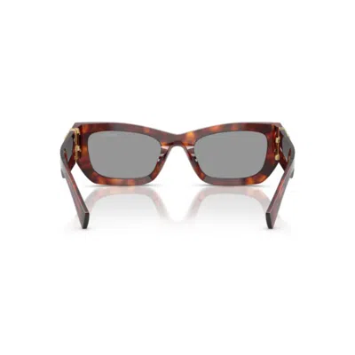 Miu Miu Cat-eye Sunglasses With Glossy Finish And Distinctive Detailing In Brown
