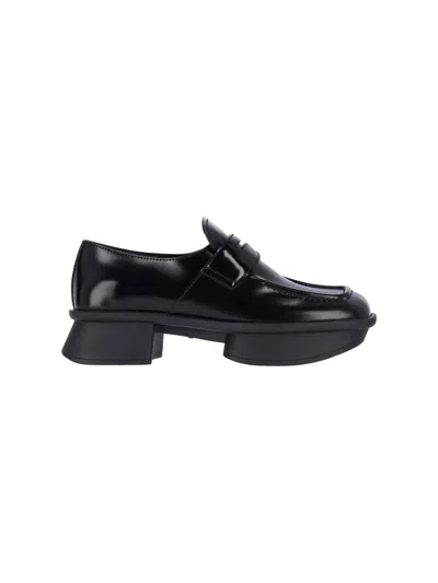 Prada Re-edition Equal Platform Penny Loafer In Black