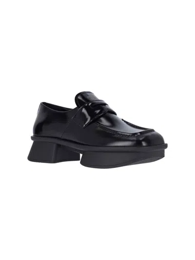 Prada Re-edition Equal Platform Penny Loafer In Black
