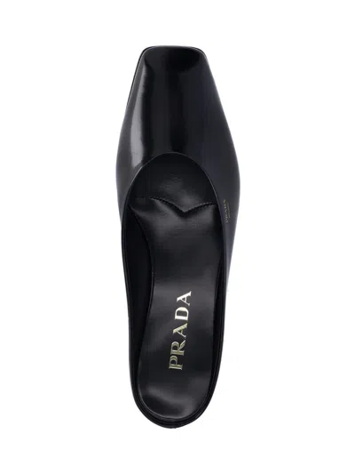 Prada Women Logo Sabots In Black