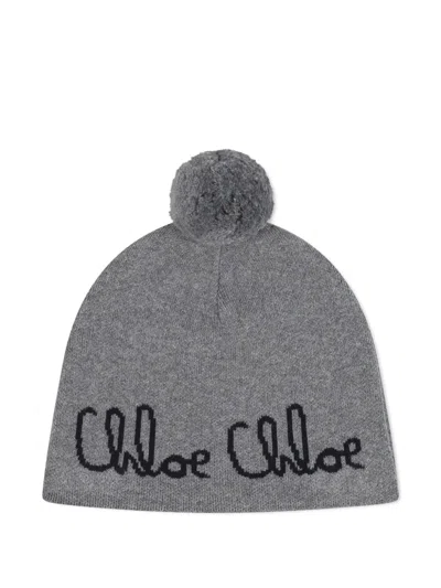 绒球细节套头帽