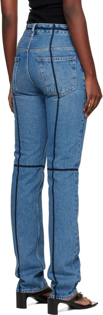 Mm6 Maison Margiela Mm6 By Maison Margiela Flared Blue Jeans With Contrasting Stitching In Blue