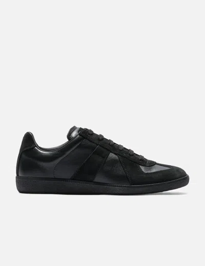 Maison Margiela Low Top Sneakers Featuring Suede Panels In Black