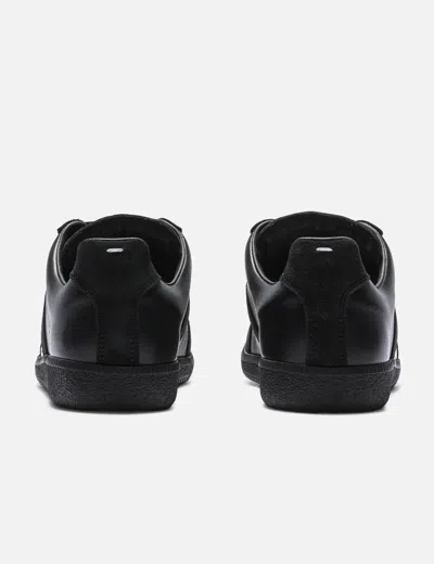 Maison Margiela Low Top Sneakers Featuring Suede Panels In Black