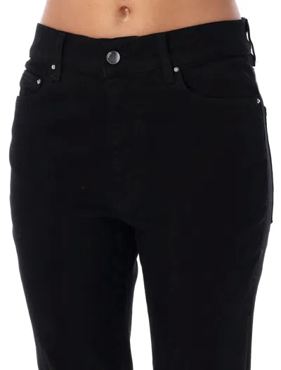 Amiri Flared Leg Denim Trousers In Black
