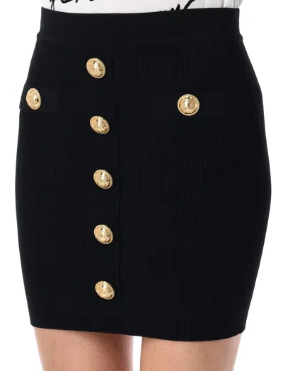 Balmain Knitted Mini Skirt With Embossed Buttons In Black