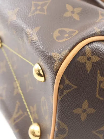 Pre-owned Louis Vuitton 2013 Tivoli Pm Monogram Handbag In Brown