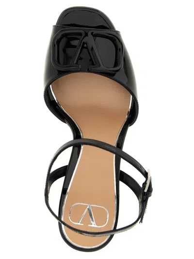 Valentino Garavani Valentino Vlogo 115 Patent Platform Sandal In Black