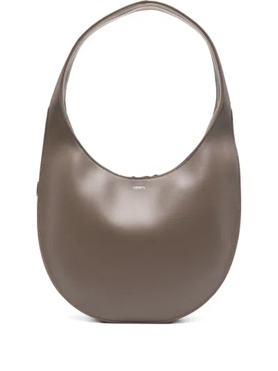 Coperni Medium Curved Shoulder Bag With Top Handle In Brown