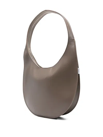 Coperni Medium Curved Shoulder Bag With Top Handle In Brown
