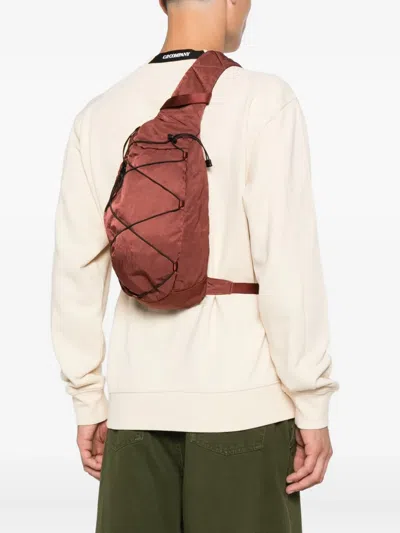C.p. Company Cross-body Strap Backpack In Brown