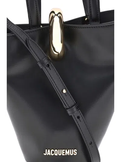 Jacquemus The Small Bambola Asymmetric Mini Bucket Bag In Black