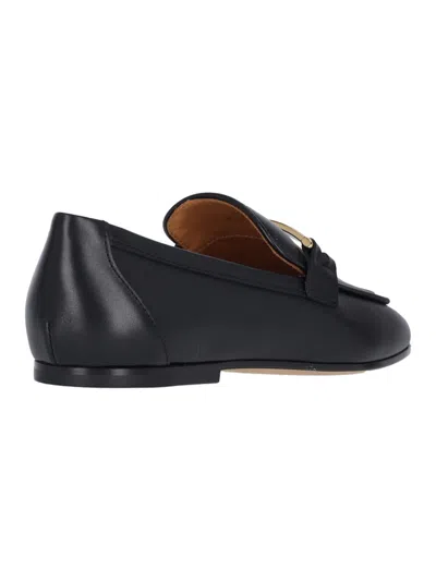 Tod's Leather Bar Detail Loafers In Black