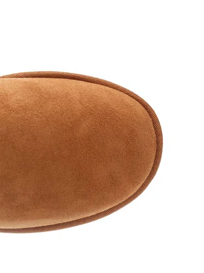 Ugg ® Classic Ultra Mini Shaggy Water Resistant Boot In Brown