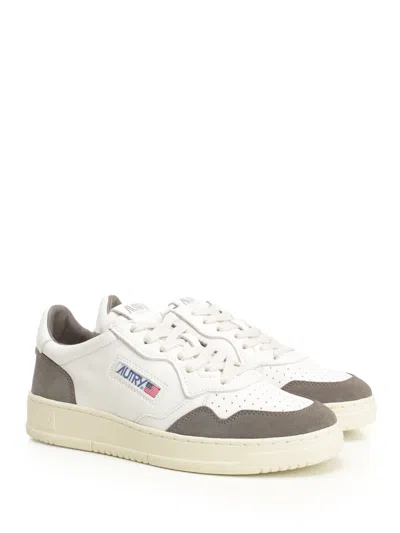 Autry Low Sneaker With Contrast Panels And Perforated Toe In Neutral