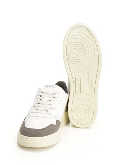 Autry Low Sneaker With Contrast Panels And Perforated Toe In Neutral