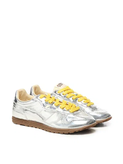 Autry Front Lace Sneakers In Bright Yellow And Shiny Silver In Gray