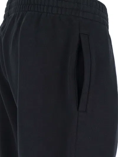 Givenchy Logo-printed Sweatpants In Black