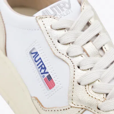 Autry Medalist Platform Sneakers With Padded Collar And Leather Insole In Gold