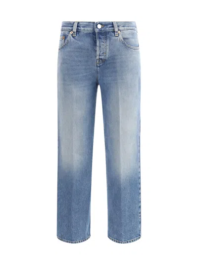 Gucci Blue Jeans With Logo Patch On The Rear And Faded Effect In Denim Woman