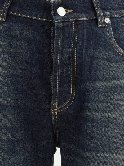 Alexander Mcqueen Wide Leg Faded Jeans In Blue