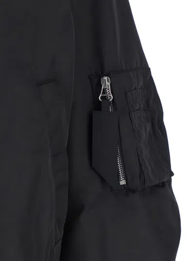 Attico Black Bomber Jacket With Front Zip Closure And One Zipped Pocket On The Sleeve In Tech Fabric Woman In Black