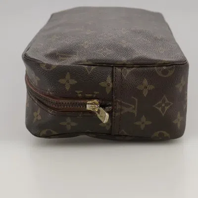 Pre-owned Louis Vuitton Trousse De Toilette Brown Canvas Clutch Bag ()