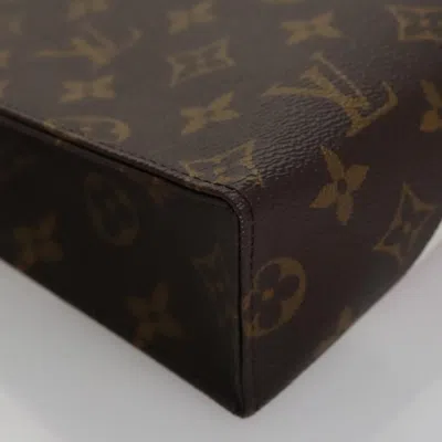 Pre-owned Louis Vuitton Trousse De Toilette Brown Canvas Clutch Bag ()
