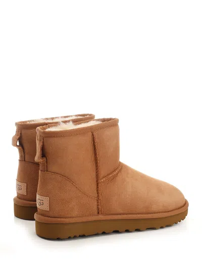 Ugg 10mm Mini Classic Ii Shearling Boots In Brown
