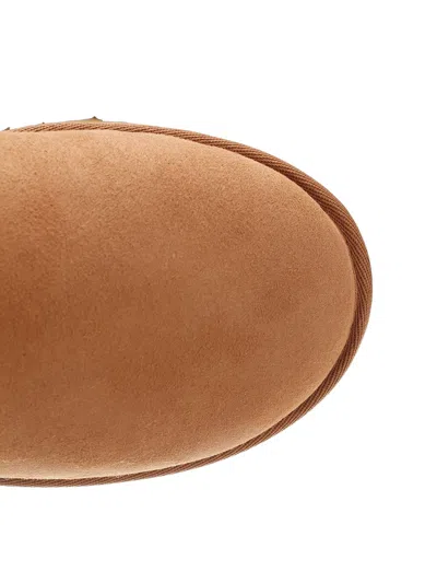 Ugg 10mm Mini Classic Ii Shearling Boots In Brown