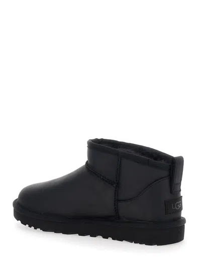 Ugg Classic Ultra Mini Black Ankle Boots With Shearling Lining In Leather Woman In Black