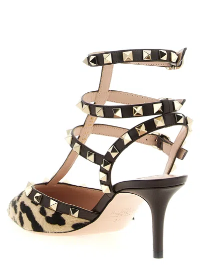 Valentino Rockstud Pointed Toe Animal Print Pumps In Multi