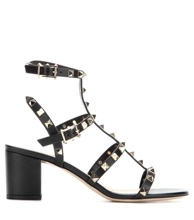 Shop Valentino Rockstud Leather Sandals In Black