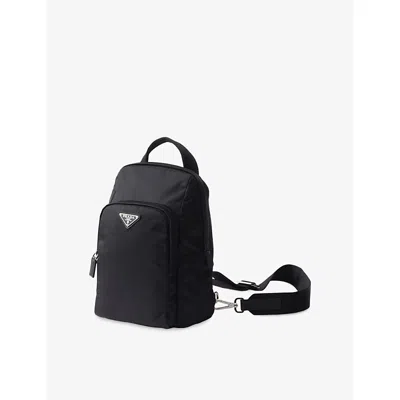 Prada Mens Black Logo-plaque Re-nylon And Saffiano-leather Backpack In Blue