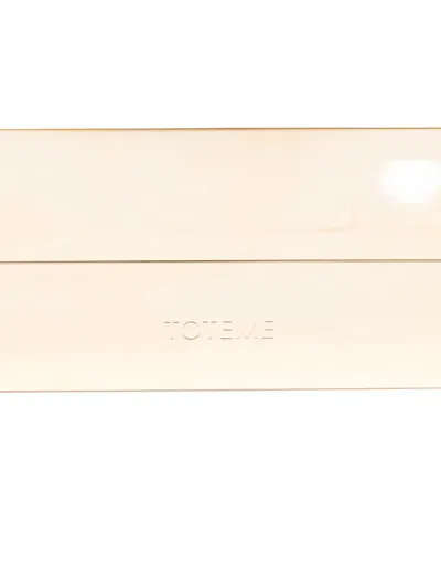 Totême Rectangular Metal Clutch In Gold